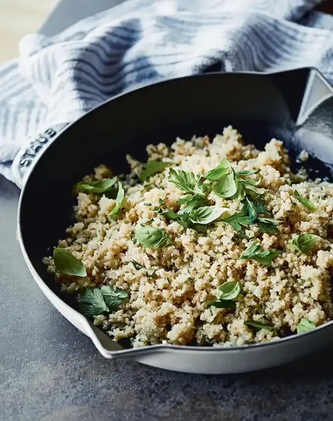 side dishes for ham: chrissy teigen garlicky cauliflower rice' title='62 Side Dishes for Ham to Serve on Easter Christmas and Every Day in Between