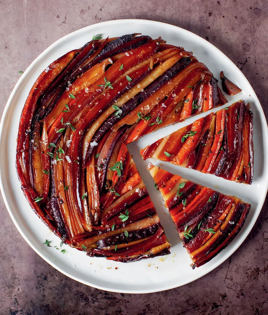 side dishes for ham: carrot tarte tatin in a serving dish with two slices cut' title='62 Side Dishes for Ham to Serve on Easter Christmas and Every Day in Between