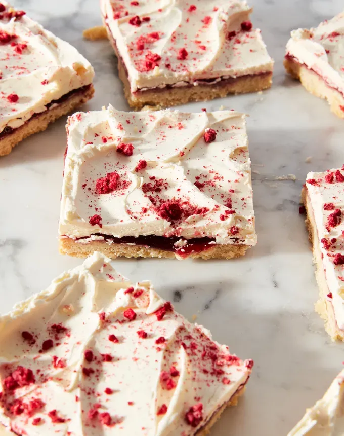 valentines day snacks: shortbread bars topped with white frosting.' title='31 Valentine’s Day Snacks That Make Sweet Lunchbox Treats