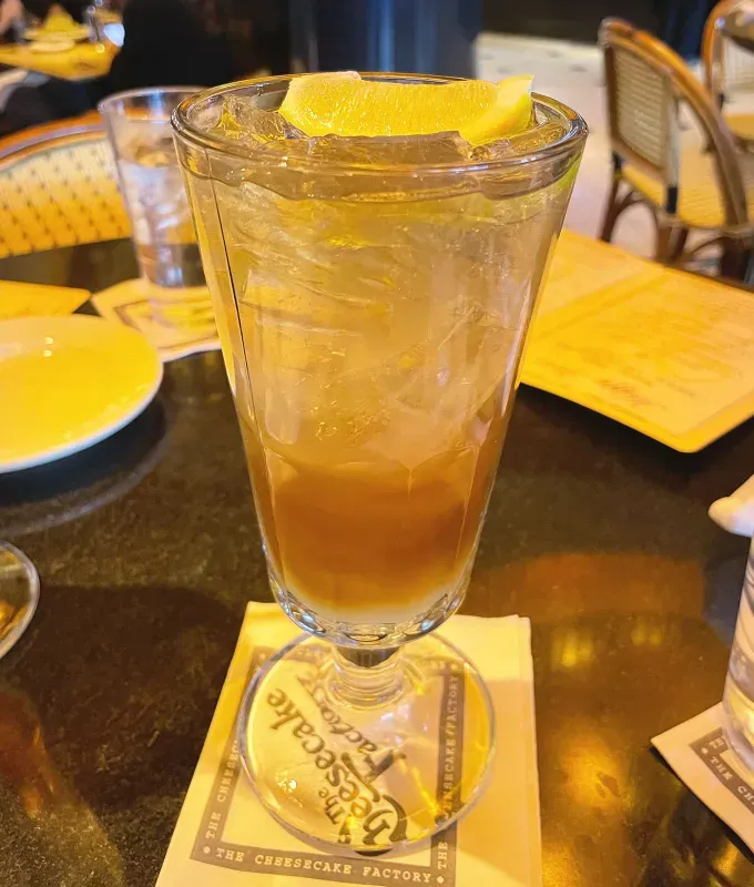 cheesecake factory happy hour drinks review: long island iced tea' title='The Cheesecake Factory’s Happy Hour Drink Menu Ranked by a Food Editor