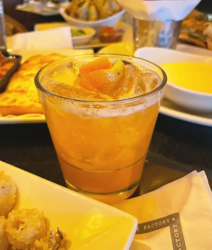 cheesecake factory happy hour drinks review: whiskey smash' title='The Cheesecake Factory’s Happy Hour Drink Menu Ranked by a Food Editor