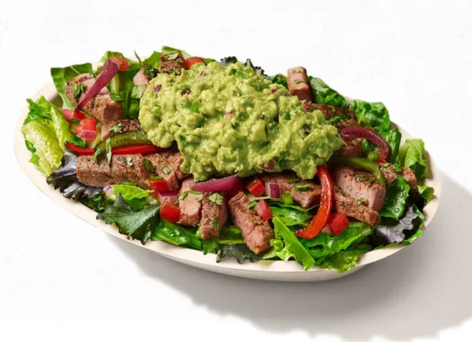 gluten free at chipotle: wholesome bowl with carne asada' fetchpriority='auto' title='How to Eat Gluten Free at Chipotle: 7 Wheatless Menu Items Worth Devouring