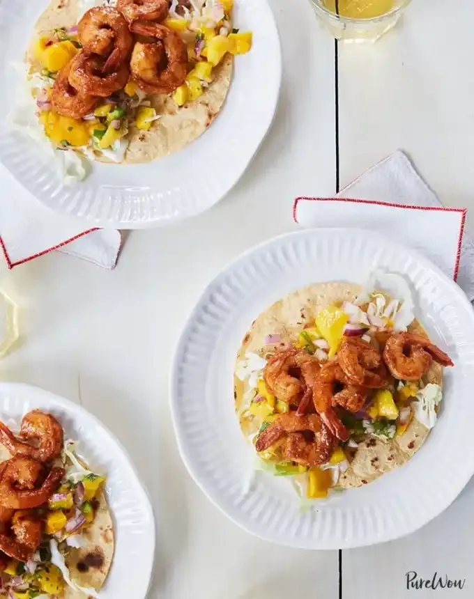 bbq menu ideas: spicy shrimp tacos with mango salsa' title='36 BBQ Menu Ideas: Recipes That Will Transform Your Backyard Party