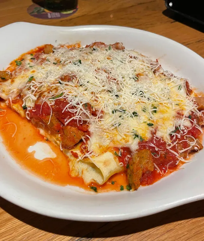 olive garden menu review: three-meat manicotti' title='4 New Olive Garden Menu Items Ranked by a Cheese-Loving Food Editor