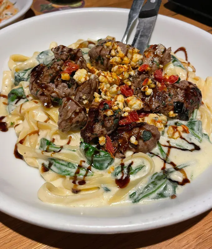 olive garden menu review: steak gorgonzola alfredo' title='4 New Olive Garden Menu Items Ranked by a Cheese-Loving Food Editor