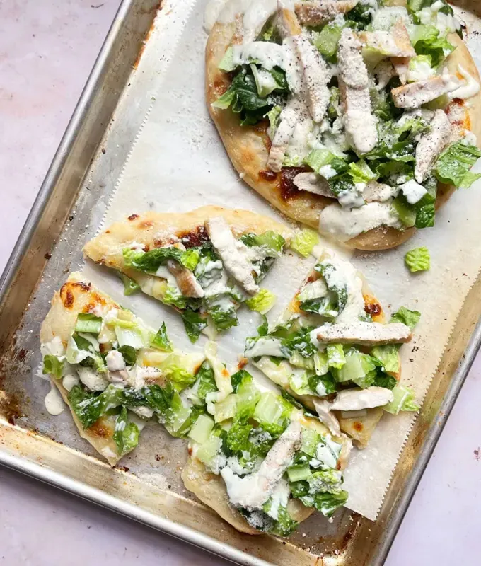 chicken meal prep recipes: chicken caesar salad pizza' title='40 Chicken Meal Prep Recipes That Never Get Boring