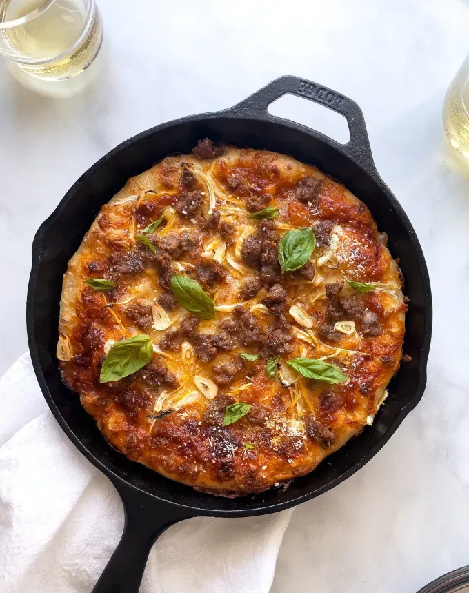 easy dinner party recipes: cast iron skillet pizza' title='34 Easy Dinner Party Recipes for Stress-Free Entertaining