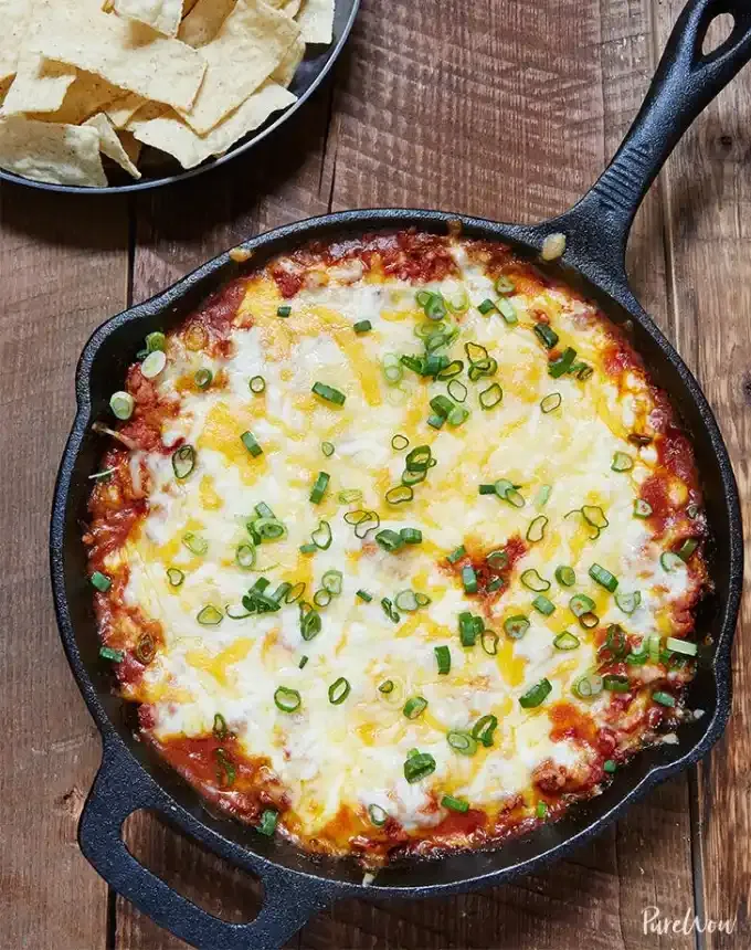 super bowl snacks game day skillet nacho dip recipe' title='70 Easy Super Bowl Snacks to Make on Game Day