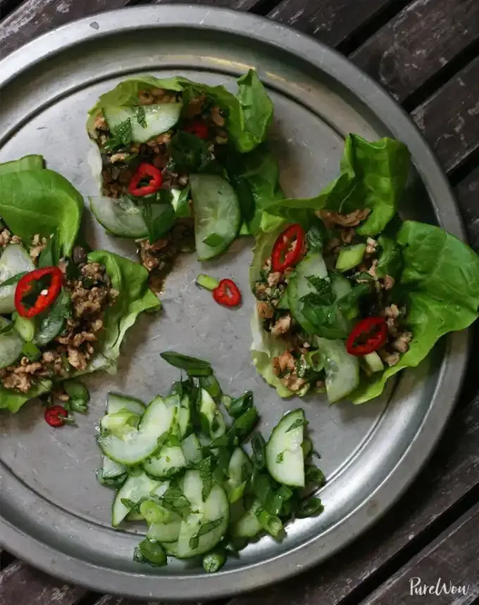 easy lunch ideas: four thai-style lettuce wraps on a silver tray' title='82 Easy Lunch Ideas That Are Fast Low-Fuss and Foolproof