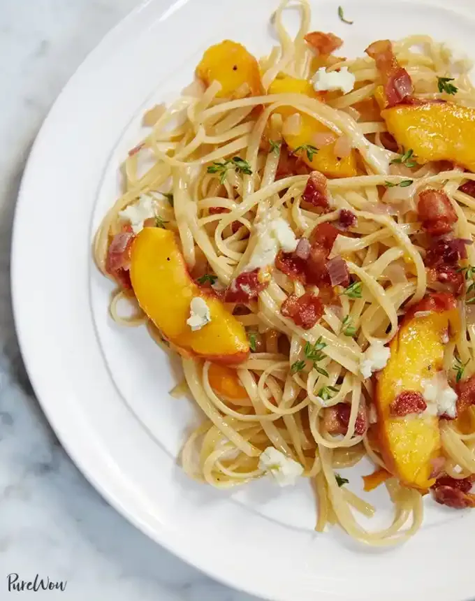 easy lunch ideas: linguine with peaches bacon and gorgonzola cheese on a plate' title='82 Easy Lunch Ideas That Are Fast Low-Fuss and Foolproof