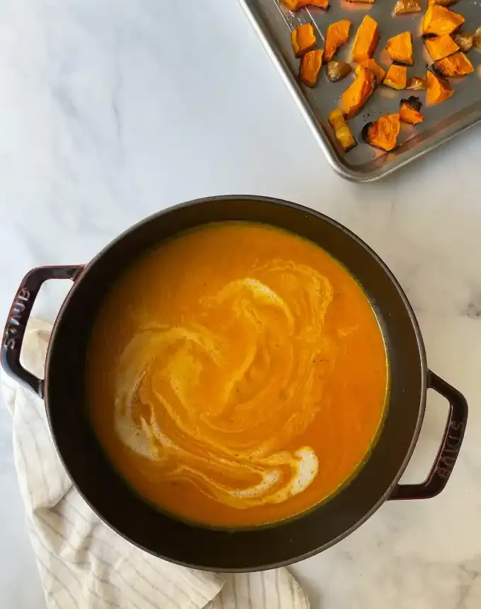 easy lunch ideas: pot of curried butternut squash soup next to a sheet pan of roasted butternut squash' title='82 Easy Lunch Ideas That Are Fast Low-Fuss and Foolproof