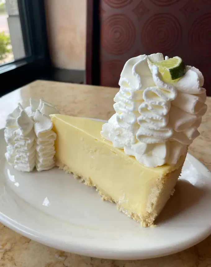 cheesecake factory cheesecakes: key lime cheesecake' title='All 34 Cheesecake Factory Cheesecakes Ranked by a Food Editor