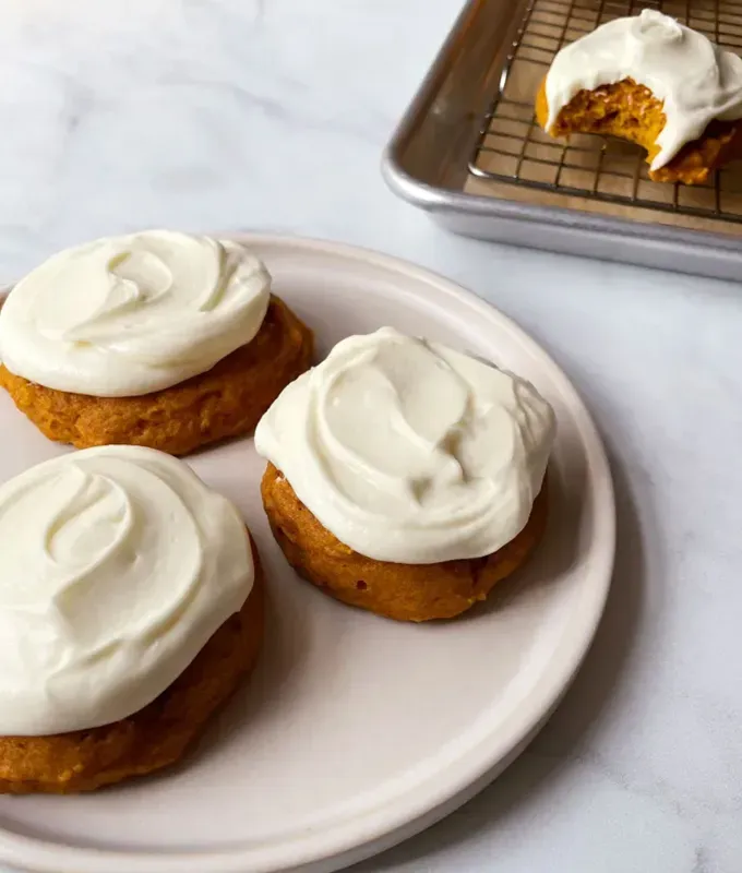 fall cookies: pumpkin cookies with cream cheese frosting' title='37 Fall Cookies to Serve for Halloween Parties Thanksgiving Dinner or Any Old Weekday
