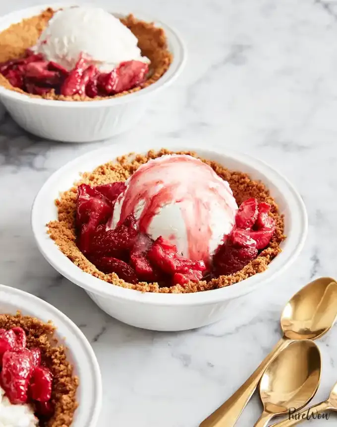 easy summer dessert recipes: mini strawberry ice cream pies' title='92 Easy Summer Desserts to Devour from Now Until Labor Day