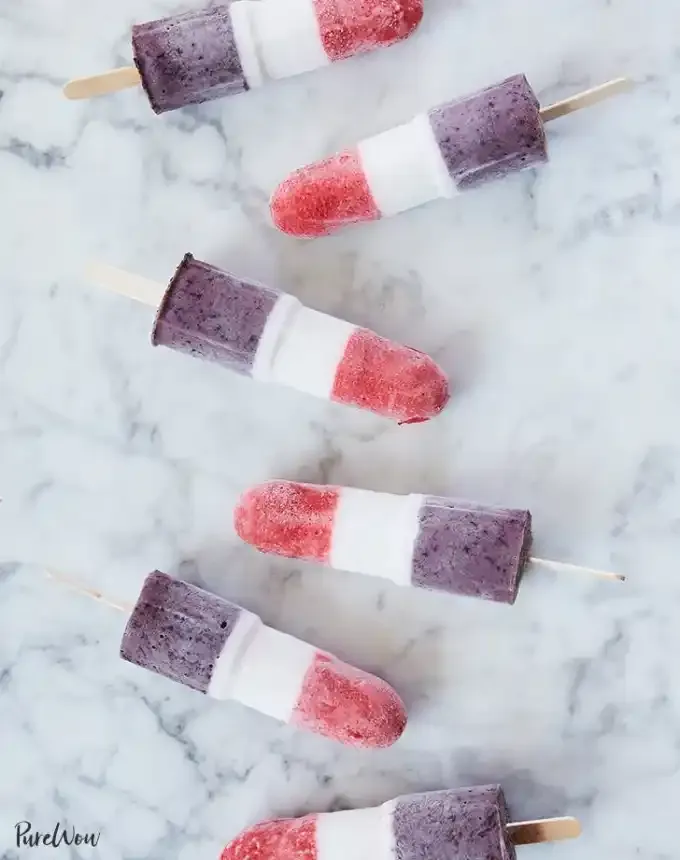 easy summer dessert recipes: berry coconut rocket pops' title='92 Easy Summer Desserts to Devour from Now Until Labor Day