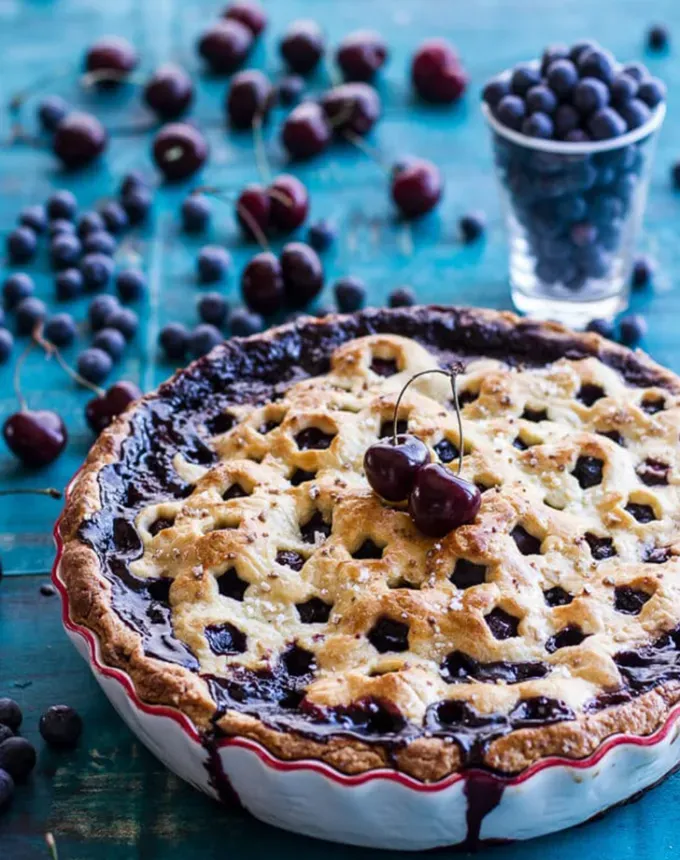 easy summer dessert recipes: vanilla bourbon cherry-blueberry pie' title='92 Easy Summer Desserts to Devour from Now Until Labor Day
