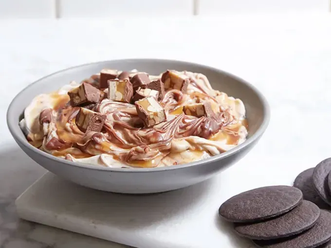 no-bake halloween treats: snickers dip' title='30 Terrifyingly Tasty No-Bake Halloween Treats