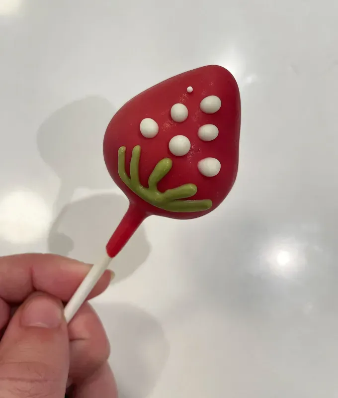 starbucks summer menu 2025 review: strawberries & cream cake pop' title='Starbucks Announced Its Summer 2025 Menu Starring a New Espresso Drink—and Our Food Editor Got an Early Taste