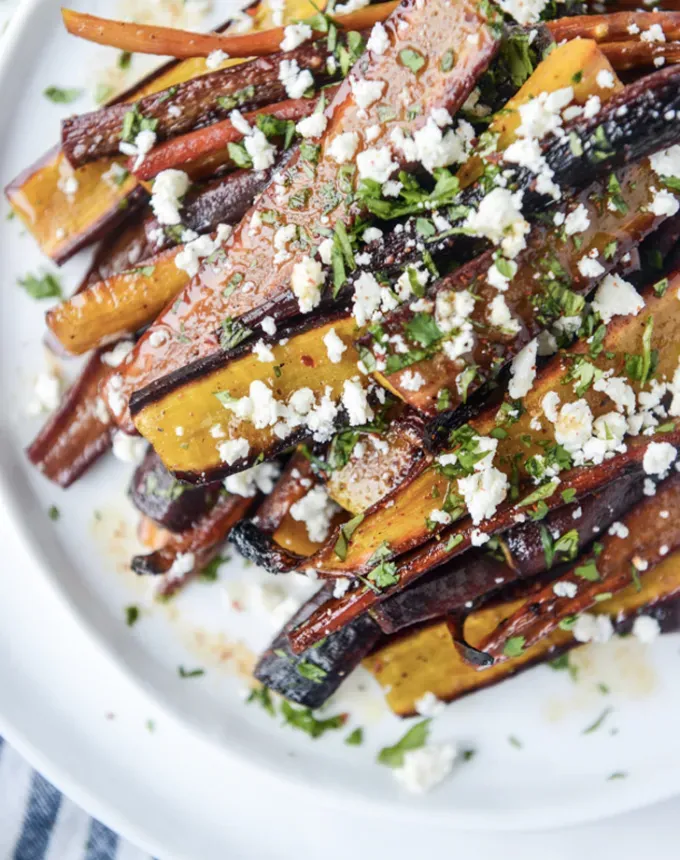what to serve with lamb: pomegranate roasted carrots' title='The 46 Best Side Dishes for Lamb to Serve at Dinner Parties Barbecues and Beyond
