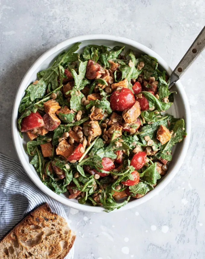 what to serve with lamb: tahini mustard sweet potato lentil and arugula salad' title='The 46 Best Side Dishes for Lamb to Serve at Dinner Parties Barbecues and Beyond
