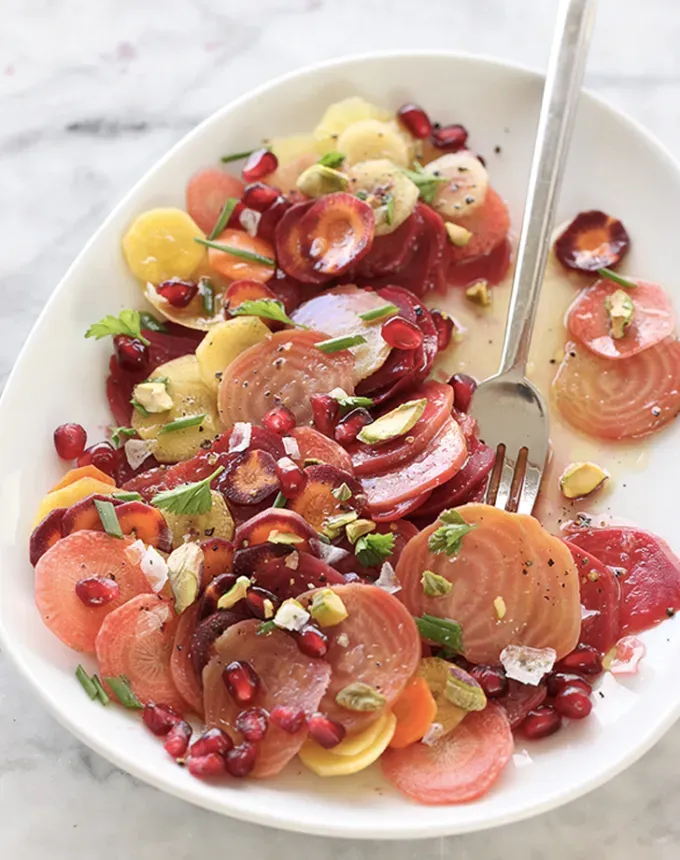 what to serve with lamb: beet carrot and pomegranate salad' title='The 46 Best Side Dishes for Lamb to Serve at Dinner Parties Barbecues and Beyond