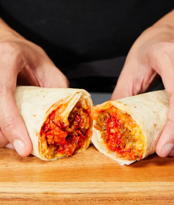 flamin’ hot burrito' title='Taco Bell Is Launching 30 New Menu Items. Here’s What’s Worth Ordering