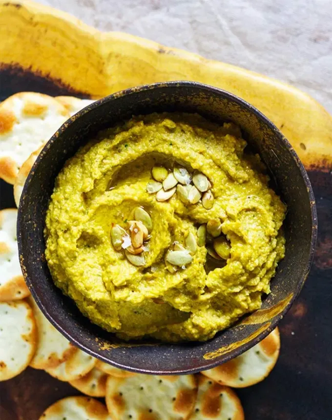 christmas snacks: roasted squash and pepita pesto dip' title='65 Christmas Snacks Even the Busiest Hosts Can Pull Off