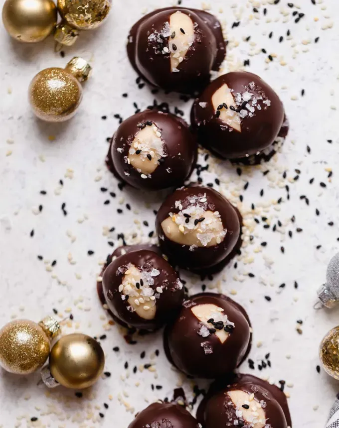 christmas snacks: tahini buckeyes' title='65 Christmas Snacks Even the Busiest Hosts Can Pull Off