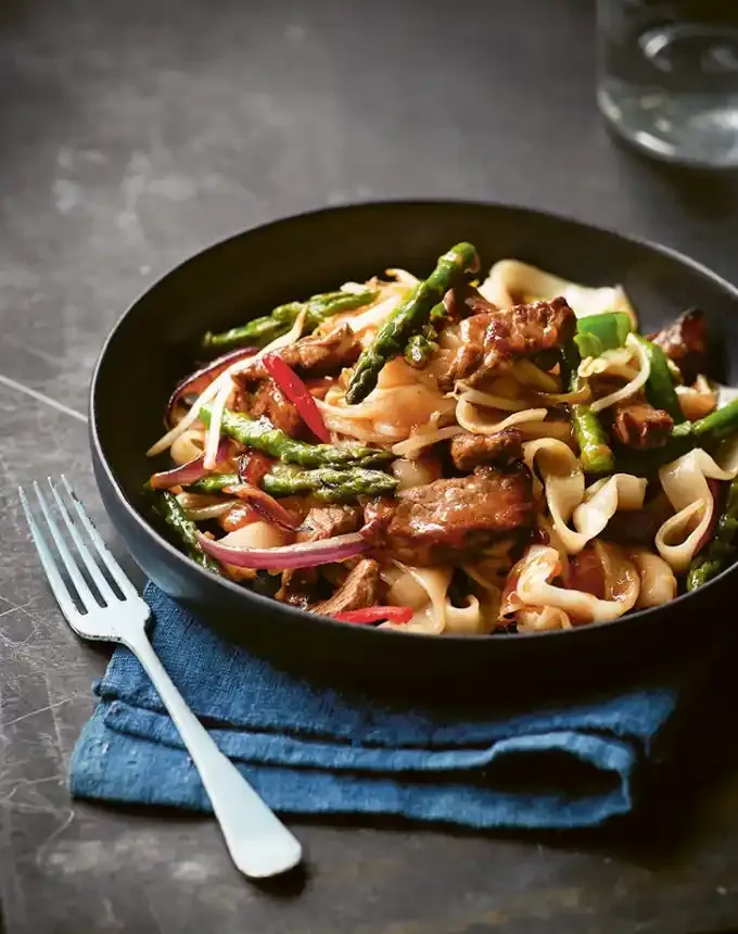 easy asian noodle soup recipes stir fried beef and asparagus with flat rice noodles recipe' title='26 Easy Asian Noodle Recipes You’ll Want to Add to Your Weekly Rotation