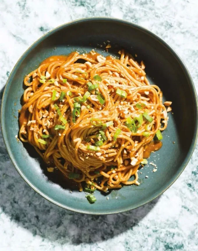 easy asian noodle recipes: hoisin ginger noodles in a blue stone bowl' title='26 Easy Asian Noodle Recipes You’ll Want to Add to Your Weekly Rotation