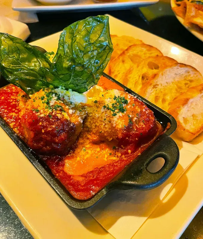 cheesecake factory happy hour appetizers: meatballs with whipped ricotta' title='I Tasted Every Appetizer on Cheesecake Factory’s Happy Hour Menu—Here’s How They Rank