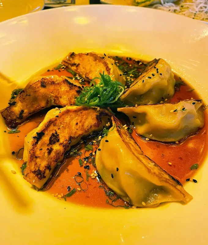 cheesecake factory happy hour appetizers: dumplings' title='I Tasted Every Appetizer on Cheesecake Factory’s Happy Hour Menu—Here’s How They Rank