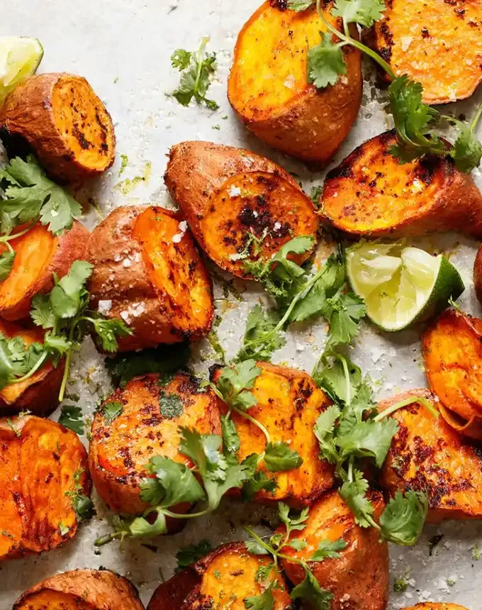 what goes with mac and cheese roasted sweet potatoes with sriracha and lime recipe' title='Wondering What Goes with Mac and Cheese? Here Are 32 Sides That Make It a Meal