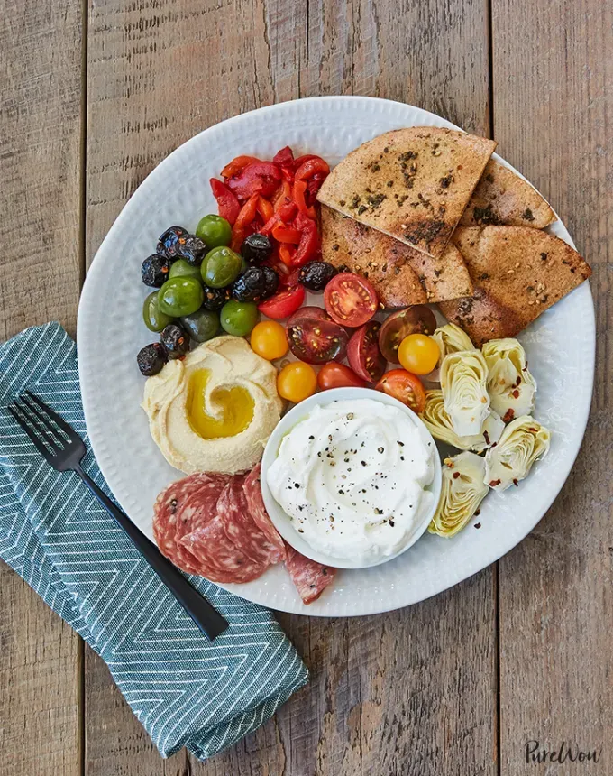 easy snacks to make at home: 15-minute mezze plate' title='51 Easy Snacks to Make at Home (That Aren’t Cheese and Crackers for the Millionth Time)