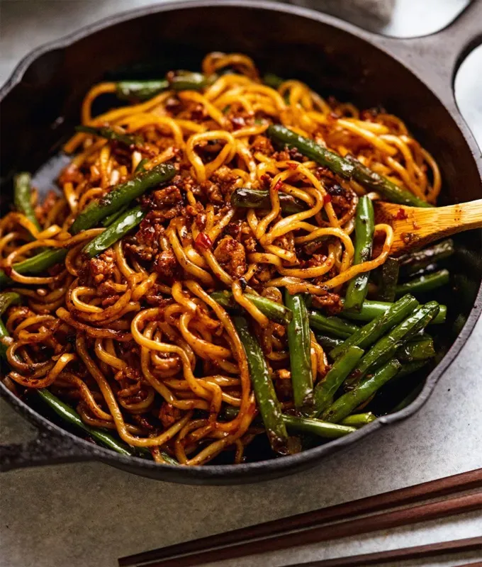 Spicy Sichuan Pork Noodles' title='53 Nontraditional Christmas Dinner Ideas to Shake Up the 2024 Holiday Season