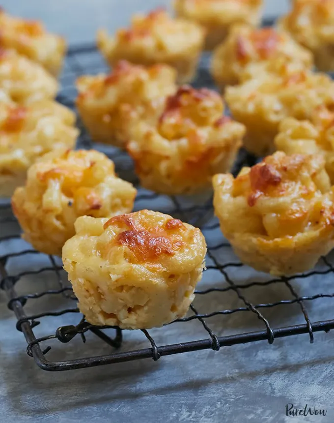 best big-batch recipes: baked mac and cheese bites on a cooling rack' title='76 Big-Batch Dishes & Recipes to Feed a Crowd