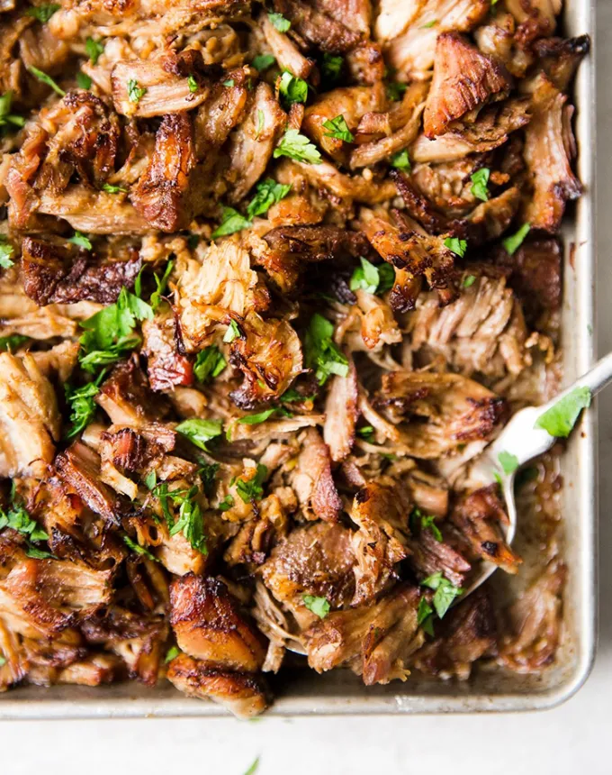 big batch recipes: close-up of slow cooker crispy chicken carnitas' title='76 Big-Batch Dishes & Recipes to Feed a Crowd