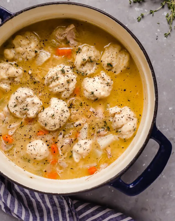 best big-batch recipes: chicken and dumplings in a large pot' title='76 Big-Batch Dishes & Recipes to Feed a Crowd