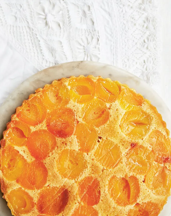best big-batch recipes: apricot and frangipane cake on a plate' title='76 Big-Batch Dishes & Recipes to Feed a Crowd