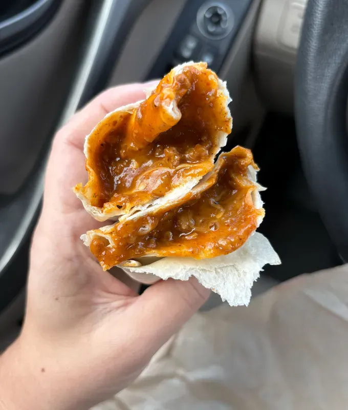 taco bell decades y2k menu review: chili cheese burrito' title='Review: Taco Bell’s Decades Y2K Menu Stars 5 Discontinued Items (Including the Cult-Favorite Chili Cheese Burrito)