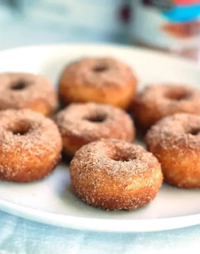 mini thanksgiving dessert recipes: cinnamon sugar doughnuts' title='54 Mini Thanksgiving Desserts That Are (Almost) Too Cute to Eat
