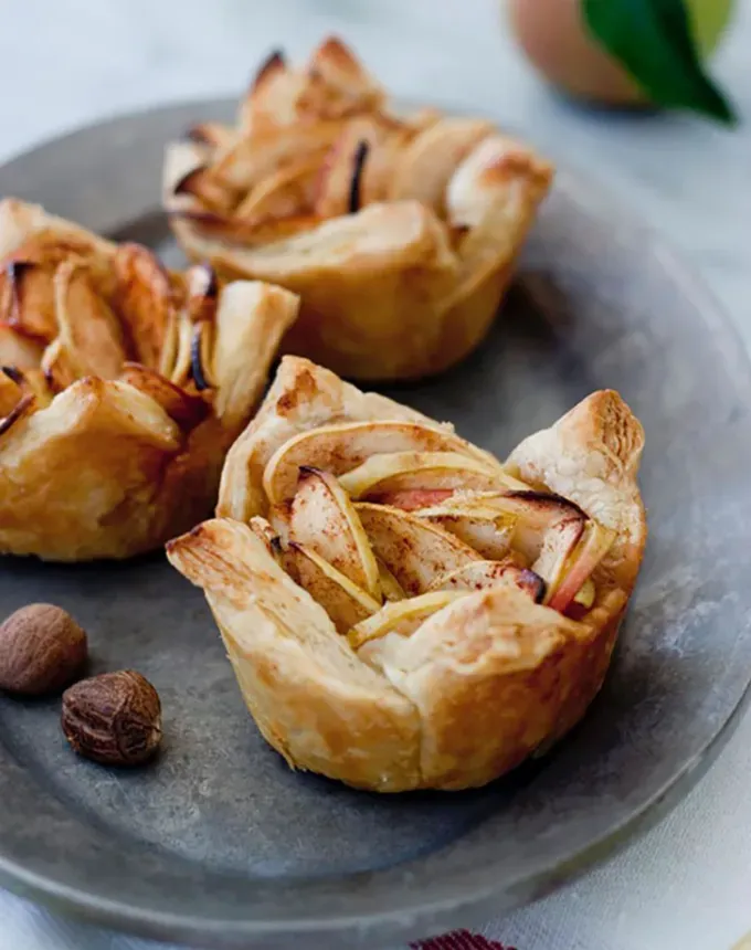 mini thanksgiving dessert recipes: baked apple cups' title='54 Mini Thanksgiving Desserts That Are (Almost) Too Cute to Eat