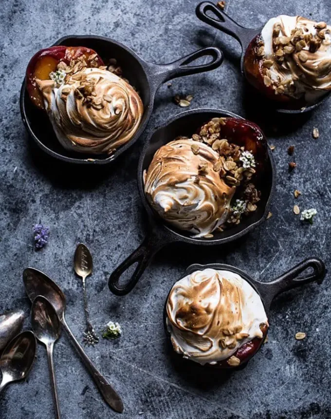 mini thanksgiving dessert recipes: bourbon and caramelized peach baked alaska' title='54 Mini Thanksgiving Desserts That Are (Almost) Too Cute to Eat