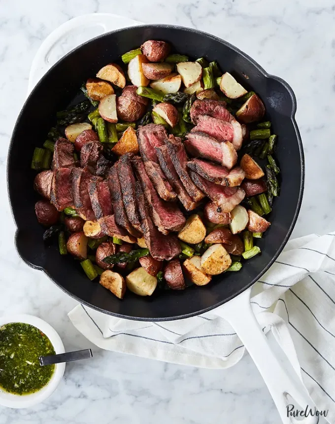 bulk dinner ideas: skillet steak with asparagus and potatoes' title='52 Bulk Dinner Ideas to Feed a Crowd