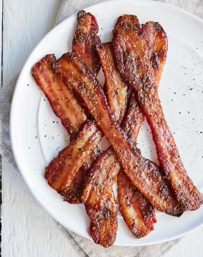 maple candied bacon' title='26 Sweet and Salty Snacks to Satisfy Your Cravings