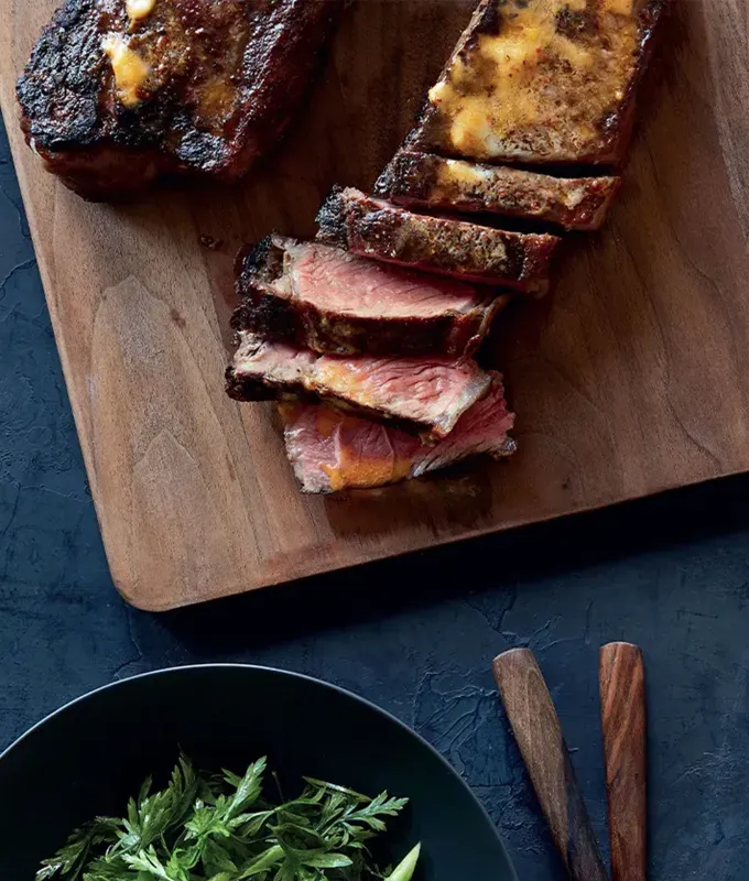 alternative thanksgiving dinner recipes: harissa steak with parsley salad' title='29 Alternative Thanksgiving Meals (That Just Might Be Better Than Turkey)