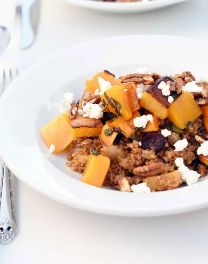 fall vegetarian recipes: bulgur with roasted butternut squash sage and goat cheese' title='30 Fall Vegetarian Recipes That Are Cozy Hearty and Packed with Seasonal Produce