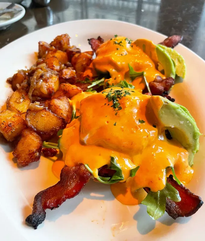 cheesecake factory brunch menu review: bacon avocado benedict' title='FYI The Cheesecake Factory Does Brunch—and I Tasted & Ranked the Entire Menu
