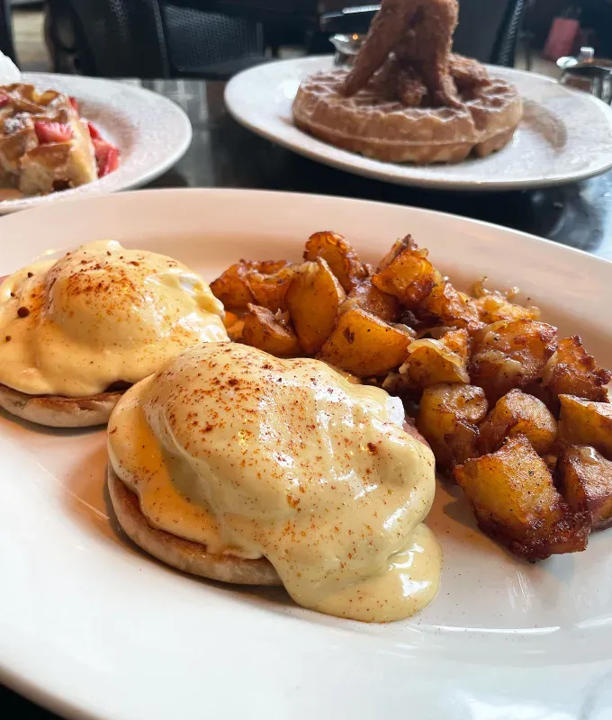 cheesecake factory brunch menu review: canadian bacon benedict' title='FYI The Cheesecake Factory Does Brunch—and I Tasted & Ranked the Entire Menu