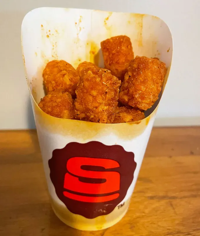 smashburger new menu review: scorchin’ hot tots' title='Smashburger’s Menu Was Majorly Revamped—Here’s a Food Editor’s Review of Every New Item